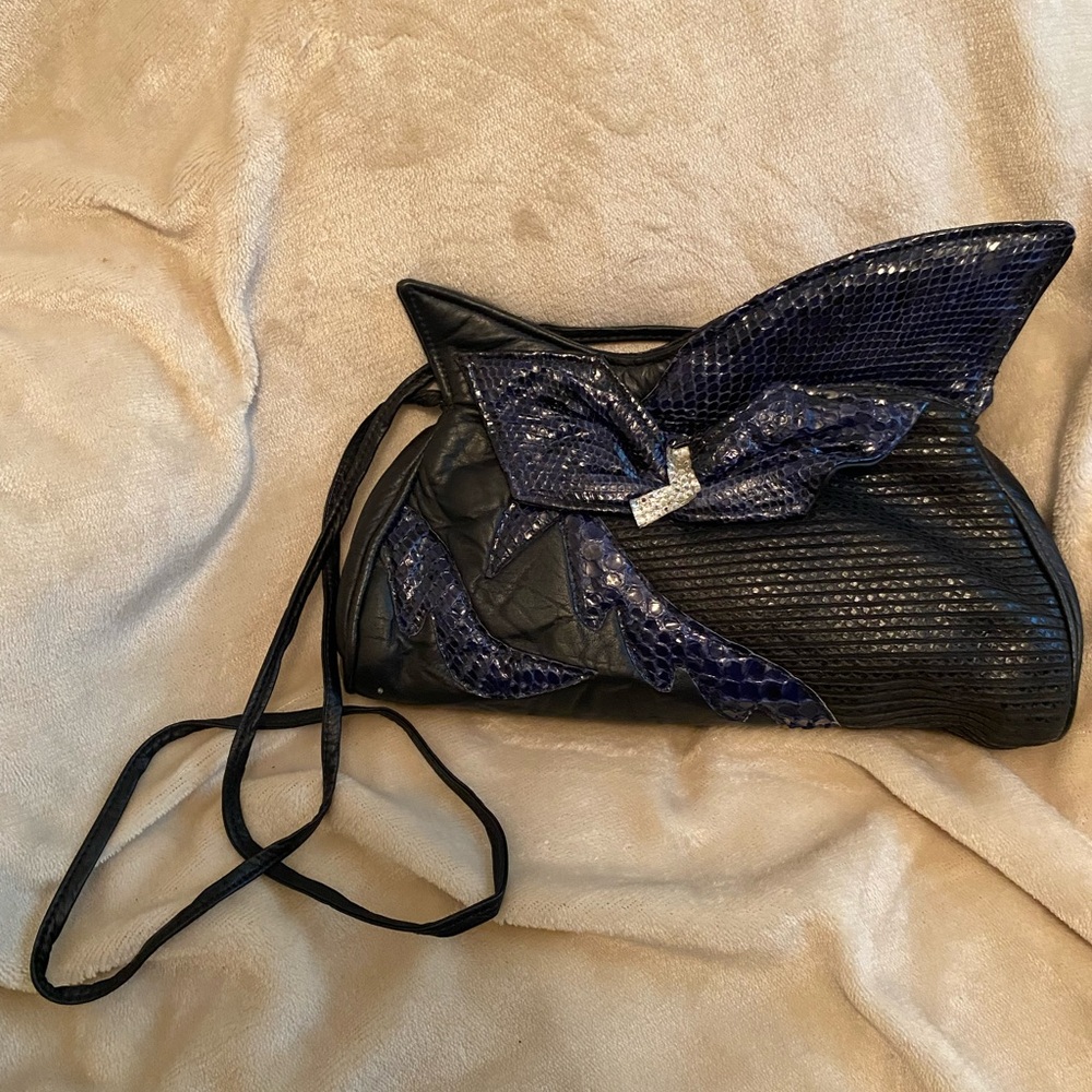 Vintage snakeskin 80s style “batwing” purse